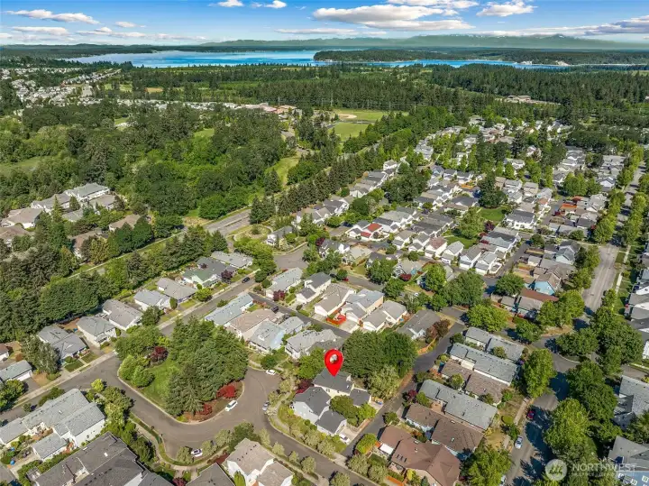 Large HOA maintained roundabout in front of the home. Plenty of street parking. 22 acre Powderworks Park is located across Center Drive.