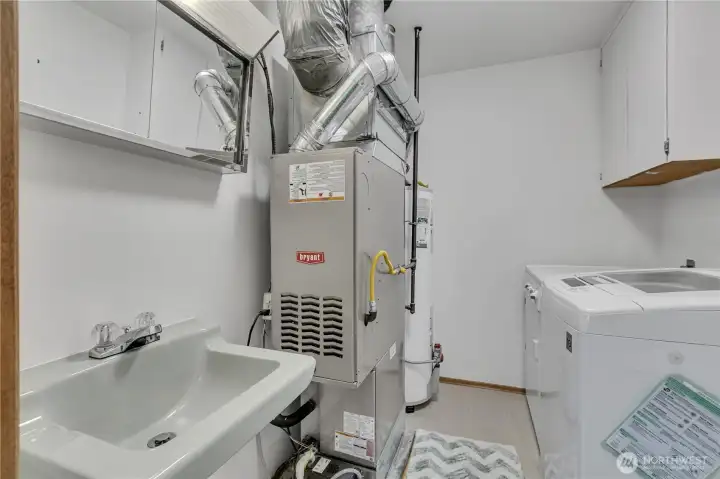Newer furnace and AC This utility room also has a 1/2 bath Newer furnace and AC This utility room also has a 1/2 bath