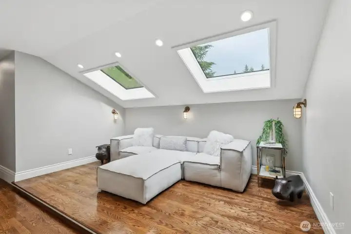 A couple special nooks with skylights for relaxing or reading respites. A couple special nooks with skylights for relaxing or reading respites.