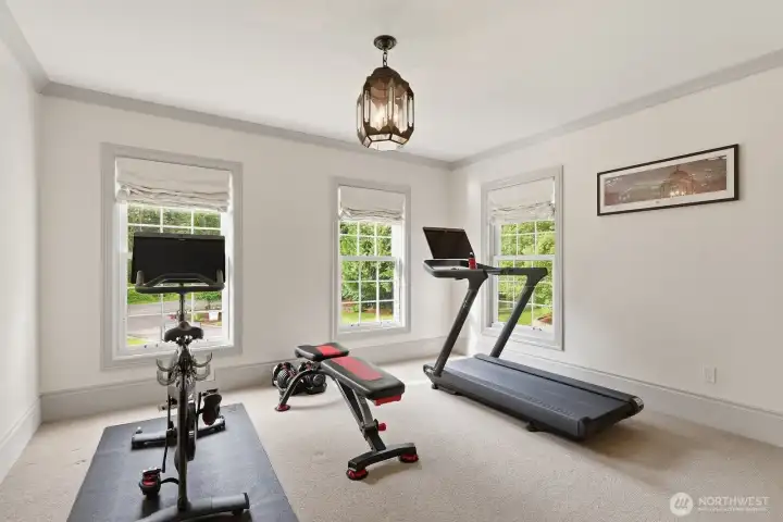Another bedroom upstairs being used as a gym. Another bedroom upstairs being used as a gym.
