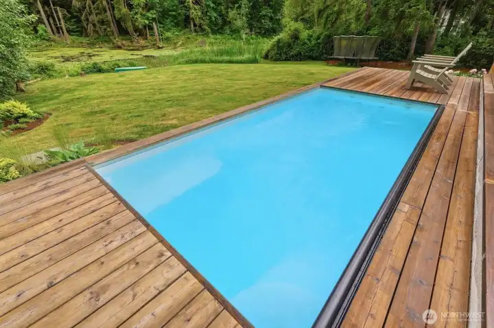 Overlooking the serene yard with your own natural pond and evergreen back drop. Overlooking the serene yard with your own natural pond and evergreen back drop.
