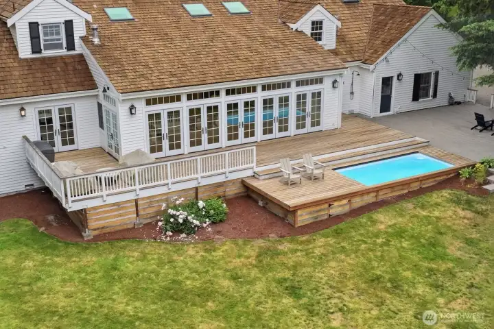 The 1.22 acre lot boasts a newer extensive natural cedar deck. The 1.22 acre lot boasts a newer extensive natural cedar deck.
