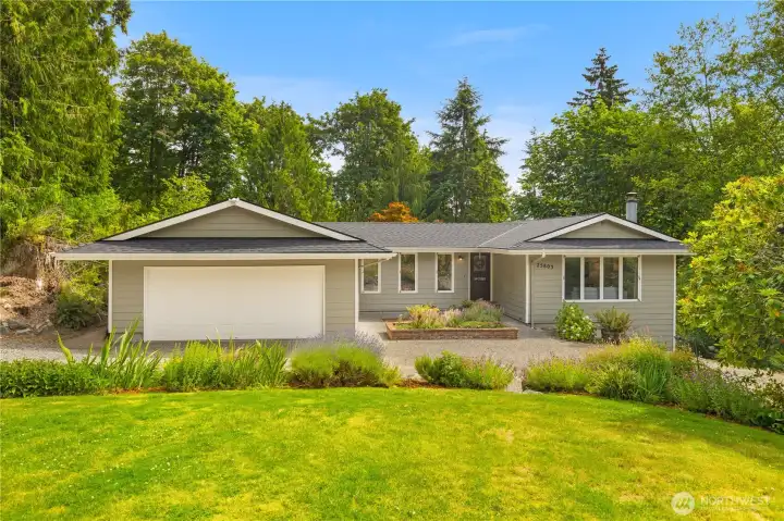 This 1 story with daylight basement is tucked back away from the street.