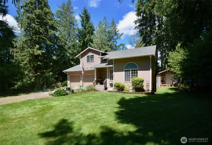 Beautifully landscaped, owners have taken pride in this home. fruit trees, garden area compost bins and beautiful flowers that bloom. Beautifully landscaped, owners have taken pride in this home. fruit trees, garden area compost bins and beautiful flowers that bloom.