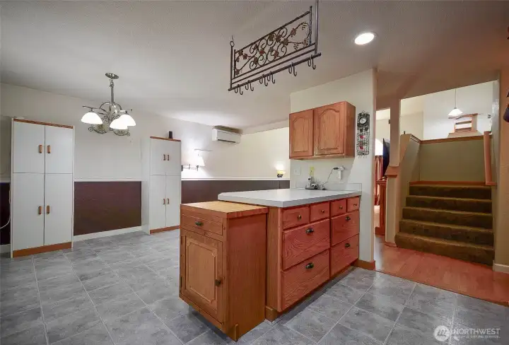 Dining area is spacious giving you easy access to kitchen, living room, garage that comes with a frezzer, and back deck. Dining area is spacious giving you easy access to kitchen, living room, garage that comes with a frezzer, and back deck.