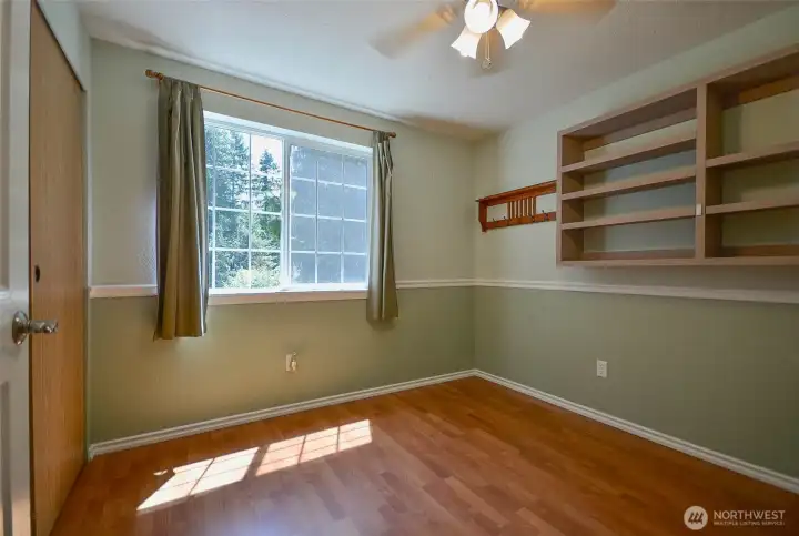 2nd bedroom is 9 x10 and has closet organizers shelves and a desk. 2nd bedroom is 9 x10 and has closet organizers shelves and a desk.