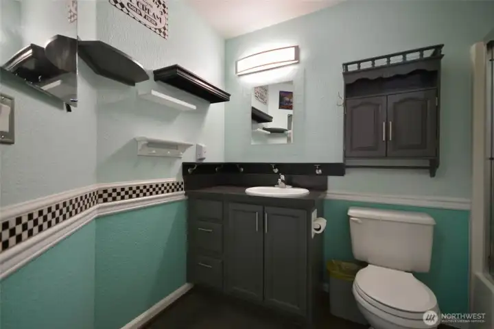 Full bathroom with tub shower combo. Full bathroom with tub shower combo.