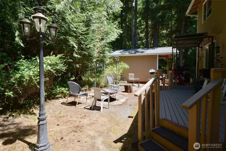 Brick fire pit. secluded with the beautiful trees. Brick fire pit. secluded with the beautiful trees.