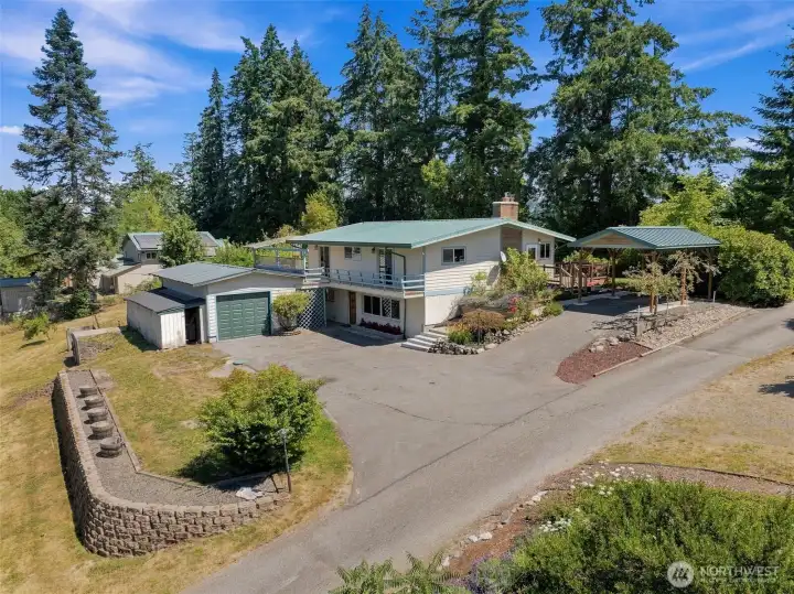 1-level home with partially finished daylight basement, paved driveway, detached garage and carport. Plenty of parking! 1-level home with partially finished daylight basement, paved driveway, detached garage and carport. Plenty of parking!