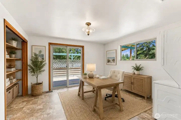 Third bedroom upstairs easily converted to office and upstairs utility room. Sliding glass door leads to wrap around balcony. (Virtually Staged) Third bedroom upstairs easily converted to office and upstairs utility room. Sliding glass door leads to wrap around balcony. (Virtually Staged)