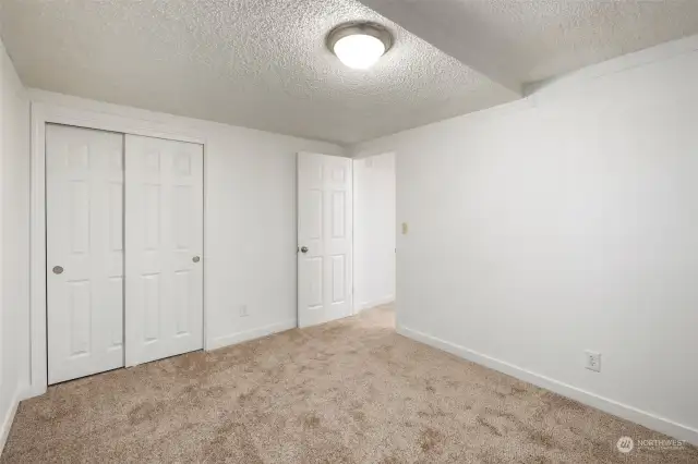 Bedroom one with ample closet space.