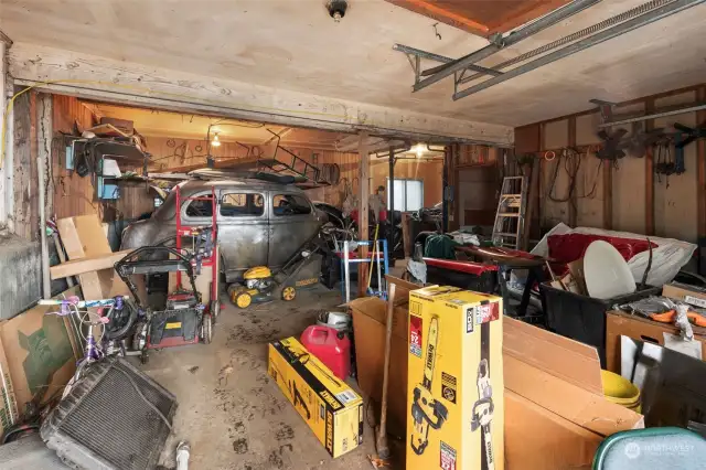 Inside of garage. Six seperate garage spaces that could be used as an additional income source.