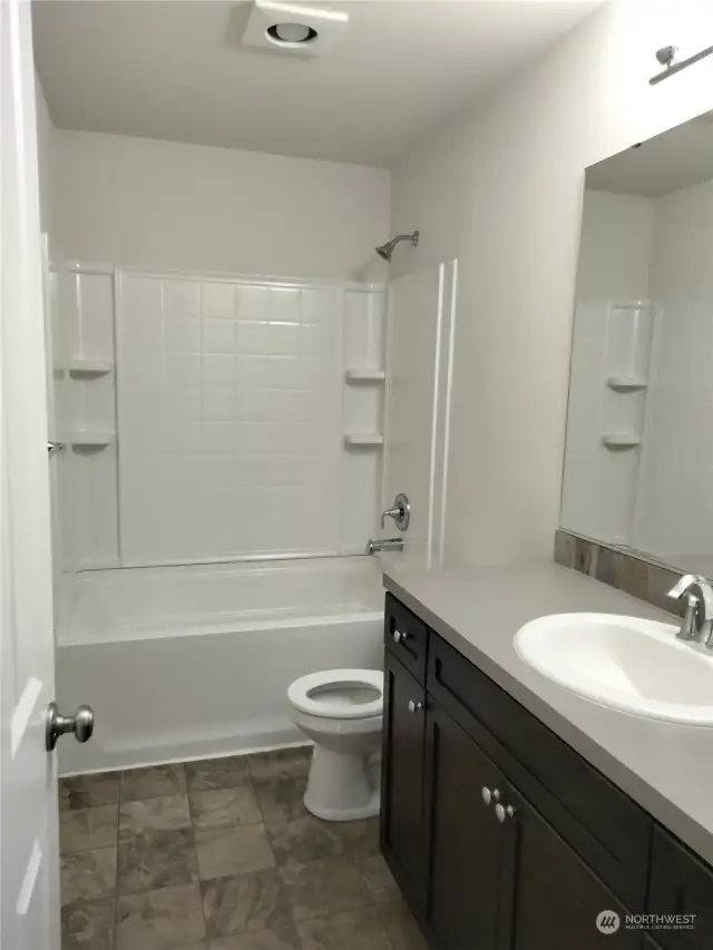 Double vanities in the shared hallway bathroom