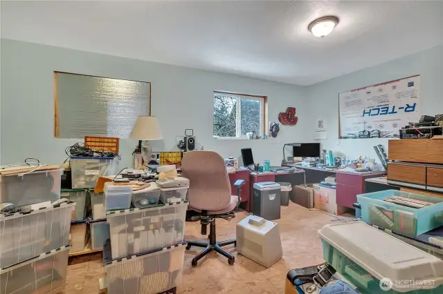 Finished bedroom in the upper apartment, currently used as office.