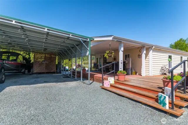 Plenty of covered parking for that RV, motor home, fifth wheel trailer, cars and trucks. There is even a hot tub in the back next to another private sitting area.