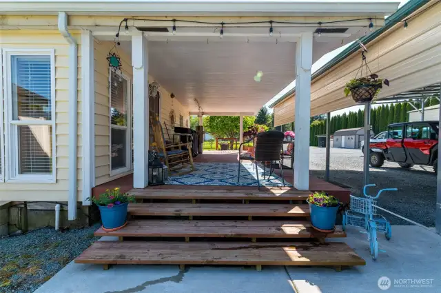 The covered porch makes entertaining a snap, ideal for relaxing and hosting year-round.