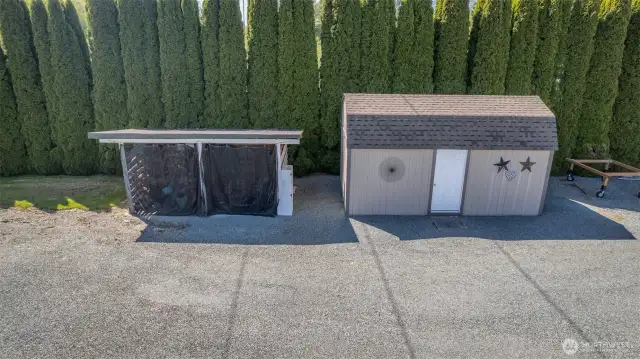 Newer storage shed and wood shed all set up and ready to go!