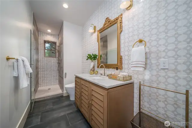 main level 3/4 bath next to main level bedroom (currently staged as an office)