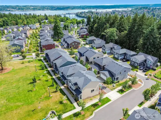 Right across from neighborhood park/grassy area and just a stroll to the water.