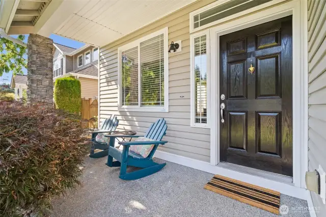 Inviting covered front porch to sit, relax and say hello to your neighbors.
