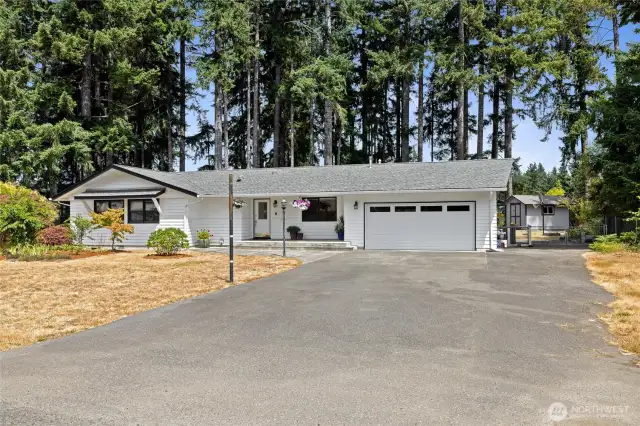 The driveway parks anywhere from 4-6 vehicles and the garage, an additional 2