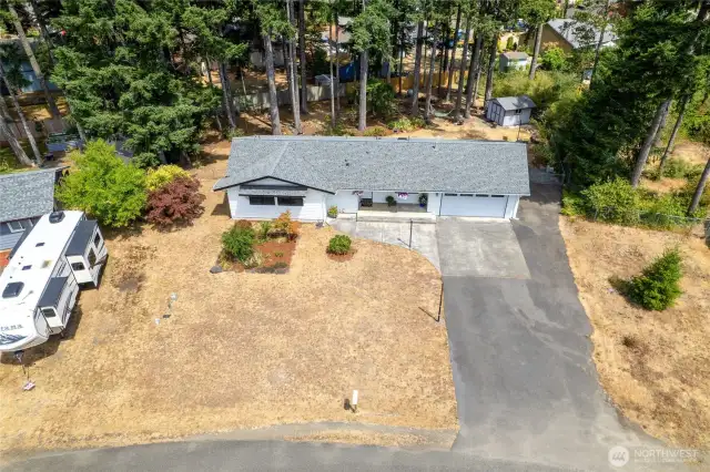 There is RV parking, space for your boat, multiple vehicles and a 2 car garage.