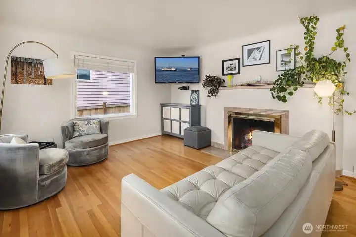 Large spacious living room with views West of the Sound and Olympic Mountains.