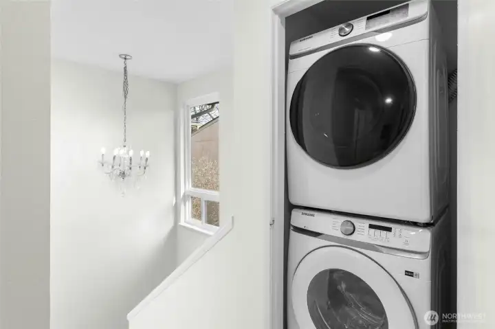 Upper level laundry closet. W/D stay.