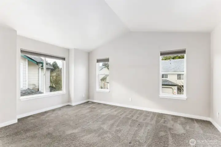 The upstairs primary bedroom has carpet to keep your feet warm and blackout blinds so you can sleep in on the weekend.