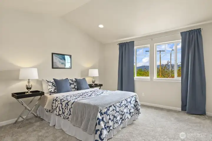 On the upper level, two large bedrooms offer flexible space for guests, hobbies, or work. With awesome storage and a full bathroom on the upper level, homeowners have the option of moving the primary upstairs or creating a second primary suite.