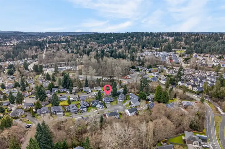 This aerial view places the home within a well established North Bothell neighborhood, surrounded by mature trees and nearby residential streets. Enjoy the convenience of Northshore School District, with quick connections to shopping, dining, and major commute routes.