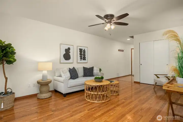 A look back toward the entry and stairway. Powder room, hall closet and door to garage are beyond to the right.