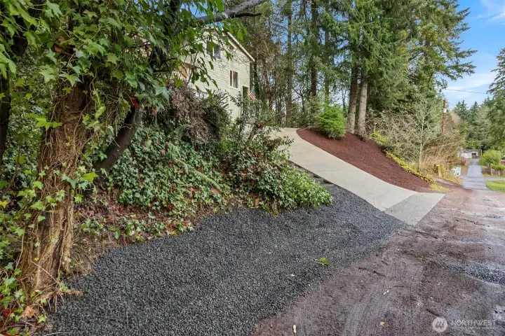 An easy place to park at the bottom of the driveway. Stairs are accessible up to the house.