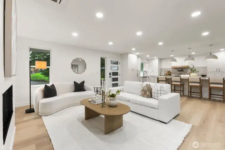 Cozy gas fireplace anchors the main living space