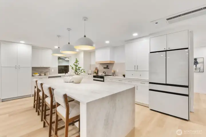 Quartz countertops and custom cabinetry throughout