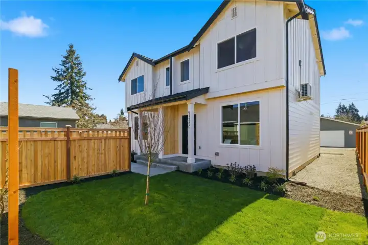 Modern exterior with clean lines, private yard space, and low-maintenance living