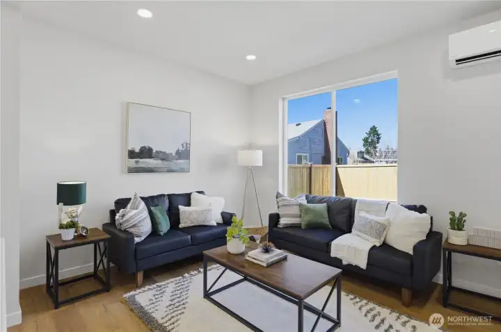 Light-filled living space with large windows and modern finishes