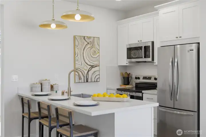 Spacious kitchen with ample storage and soft-close cabinetry