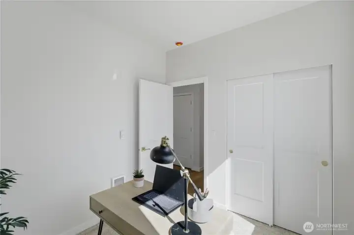 Additional photo of main-level bedroom or office space