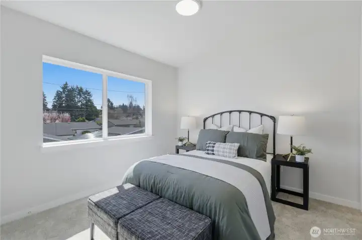 Primary suite with natural light and comfortable layout