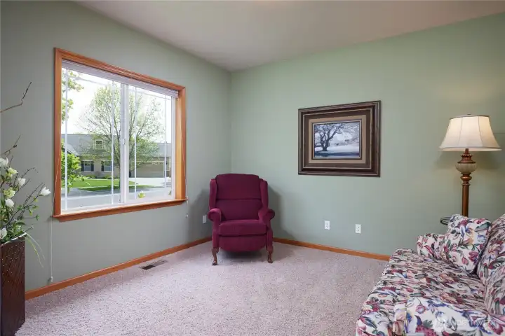 Just inside the entry, to the left is a flexible space you  can use however you like.   Home Office, Fitness Room or Yoga Space,  Toy room, Crafts, etc.     How would you use it?