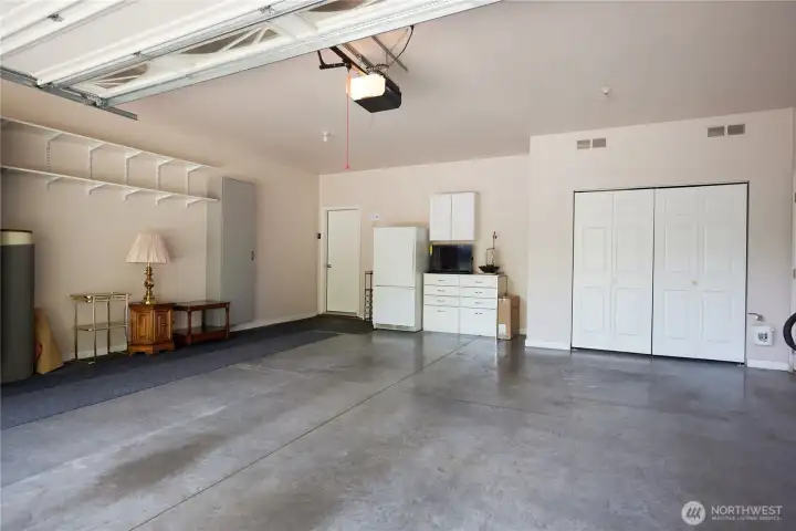 Spacious garage with plenty of storage.