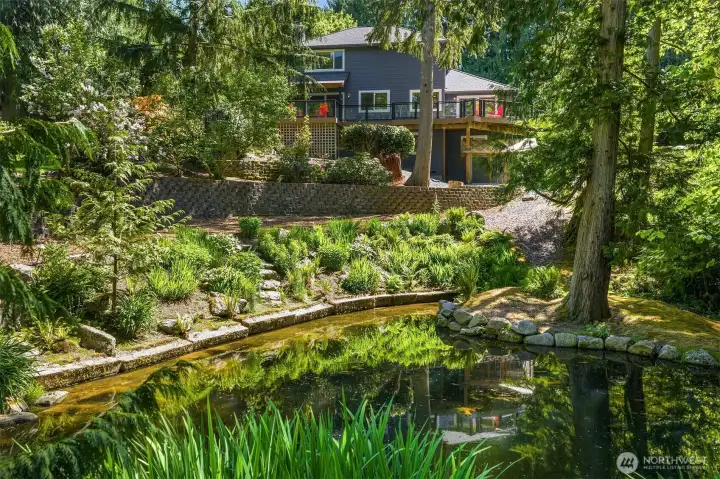 Picture perfect setting with your own stocked Trout pond!
