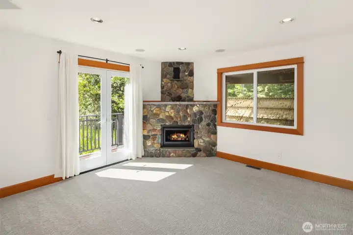 Lower level rec room has it's own private deck and gas fireplace.  Would also make a great office/guest room.