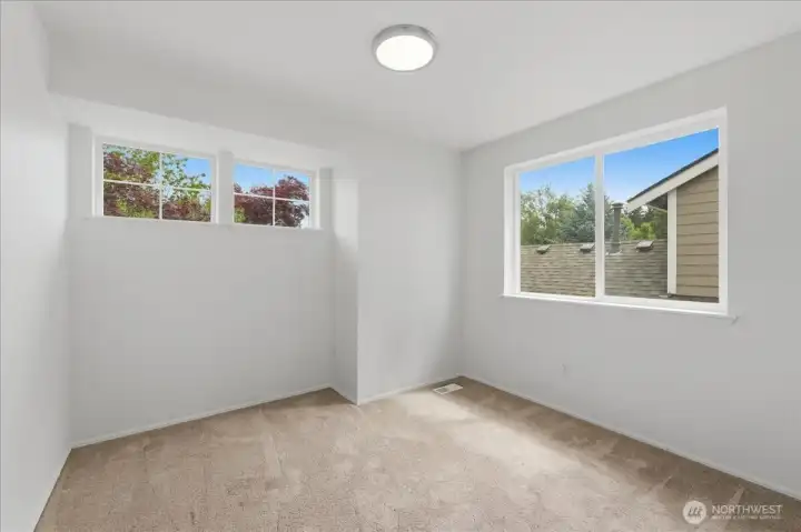 Upstairs corner bedroom. Lots of light.