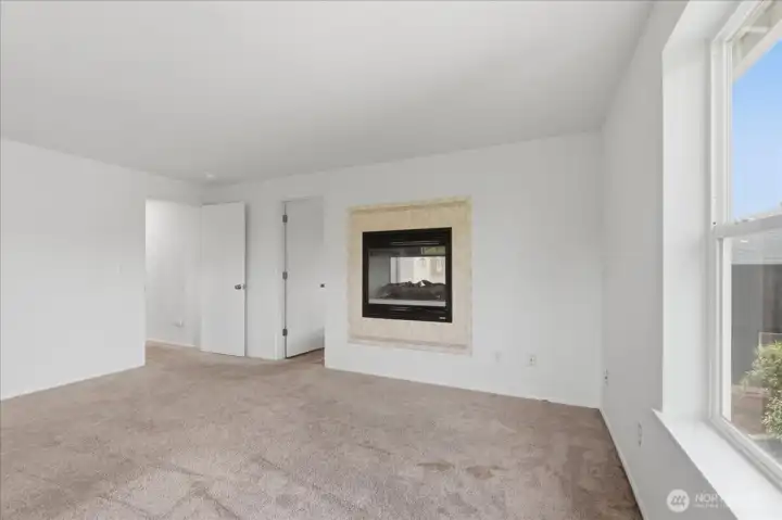 Gas fireplace in Primary suite, charm, and warmth.