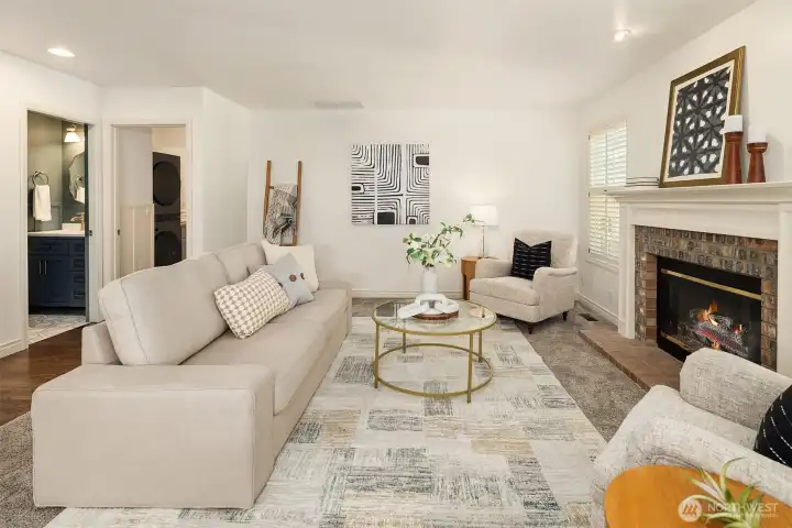 Convenient powder room to your left. Laundry room and door to garage just beyond that.