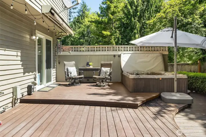 Ready to have fun? Step outside and into your private hot tub. Rain or shine - it doesn't matter - you are covered! There is also a sun awning that covers this area on warmer days.
