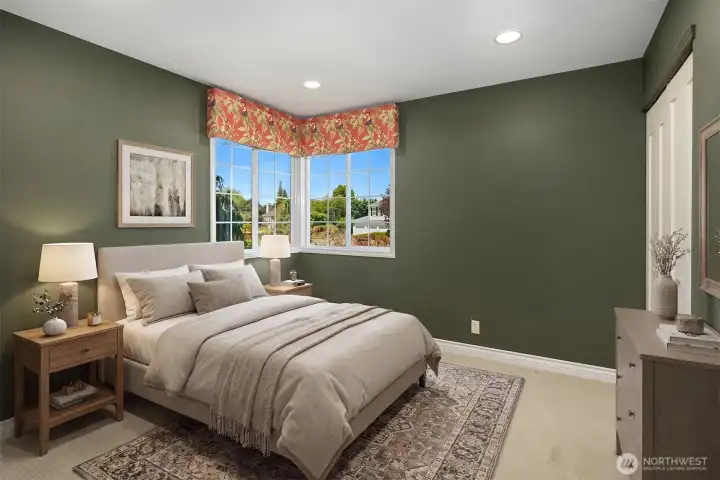 One of 4 bedrooms upstairs. This photo has been virtually staged