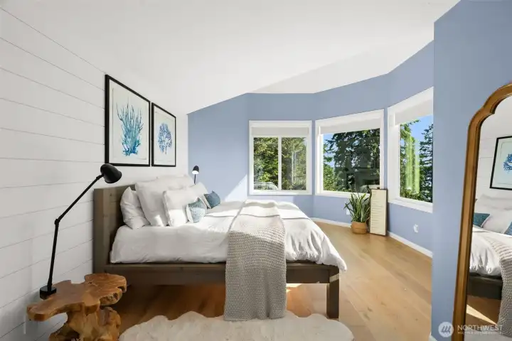 You will love waking up to an elevated view of the sound that takes your breath away. The primary bedroom has plenty of room for a large bed and nightstands.